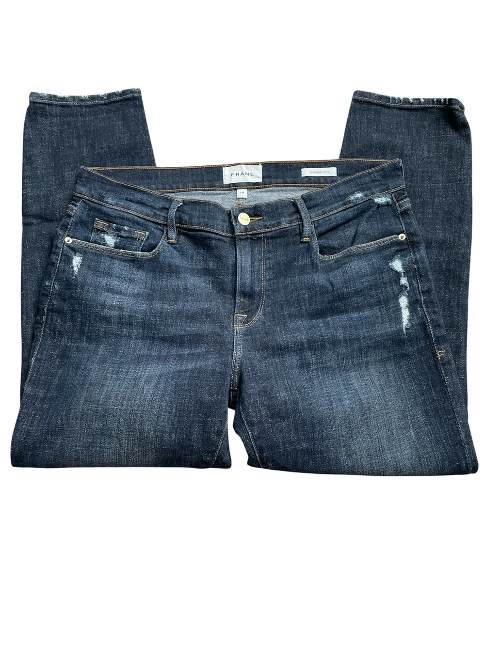Frame dark wash Le Garçon crop jeans.